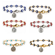 Hannah Evil Eye Saint Medal Bracelet color collection showing red, blue, turquoise, and black evil eye bead styles with gold-tone and silver-tone rhodium-plated brass details and religious medal charms