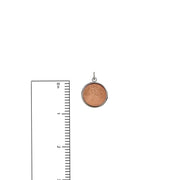 Remembrance coin charm framed in silver measurement