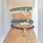  harper mom bracelet stack with rainbow flower charm and bee charm love lisa