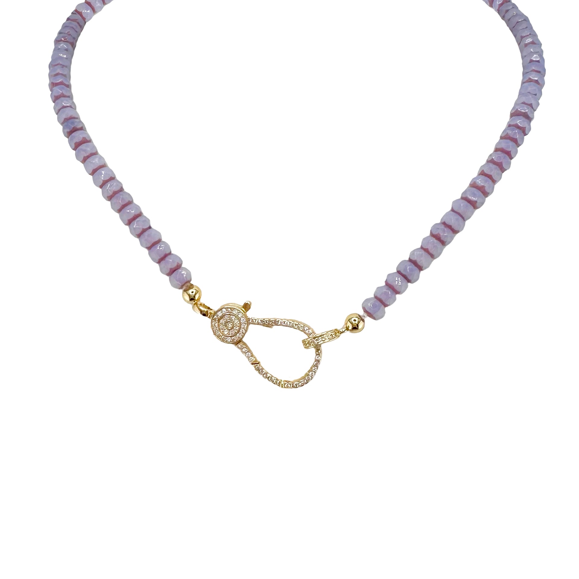 A purple beaded necklace with a gold pave clasp.