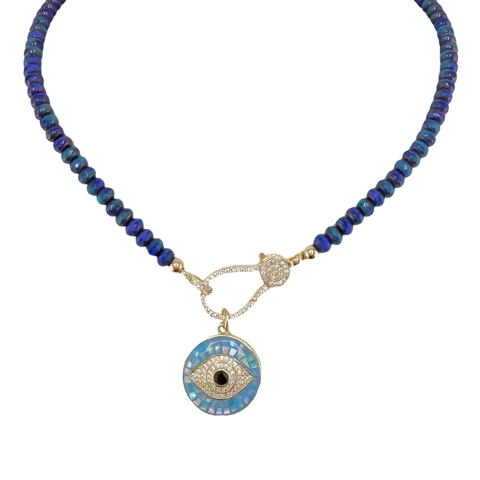 A blue beaded necklace with a gold pave clasp.