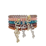 Stack of harper love bracelets made with czech crystal beads