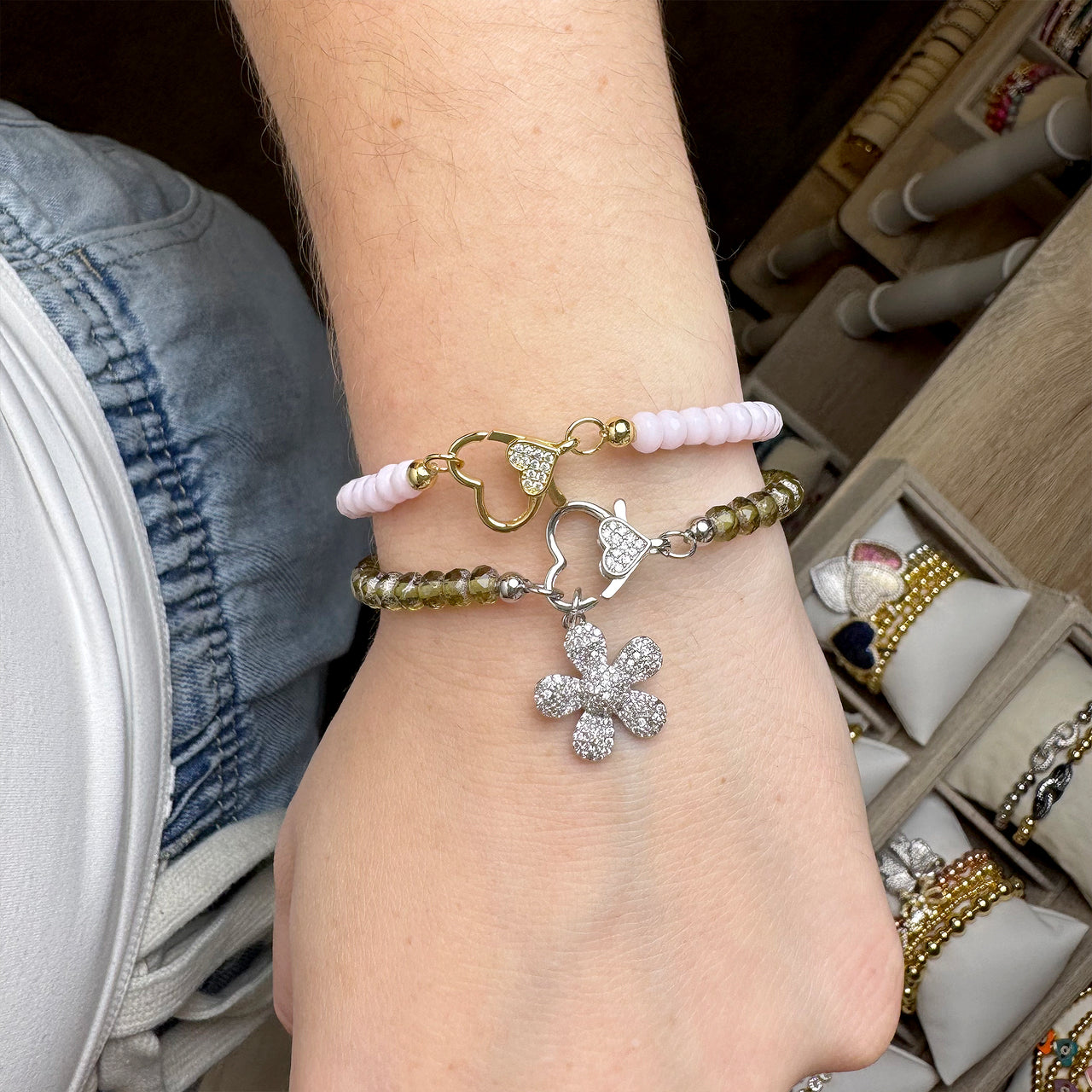 harper bracelet stacked on wrist with mini charm love lisa