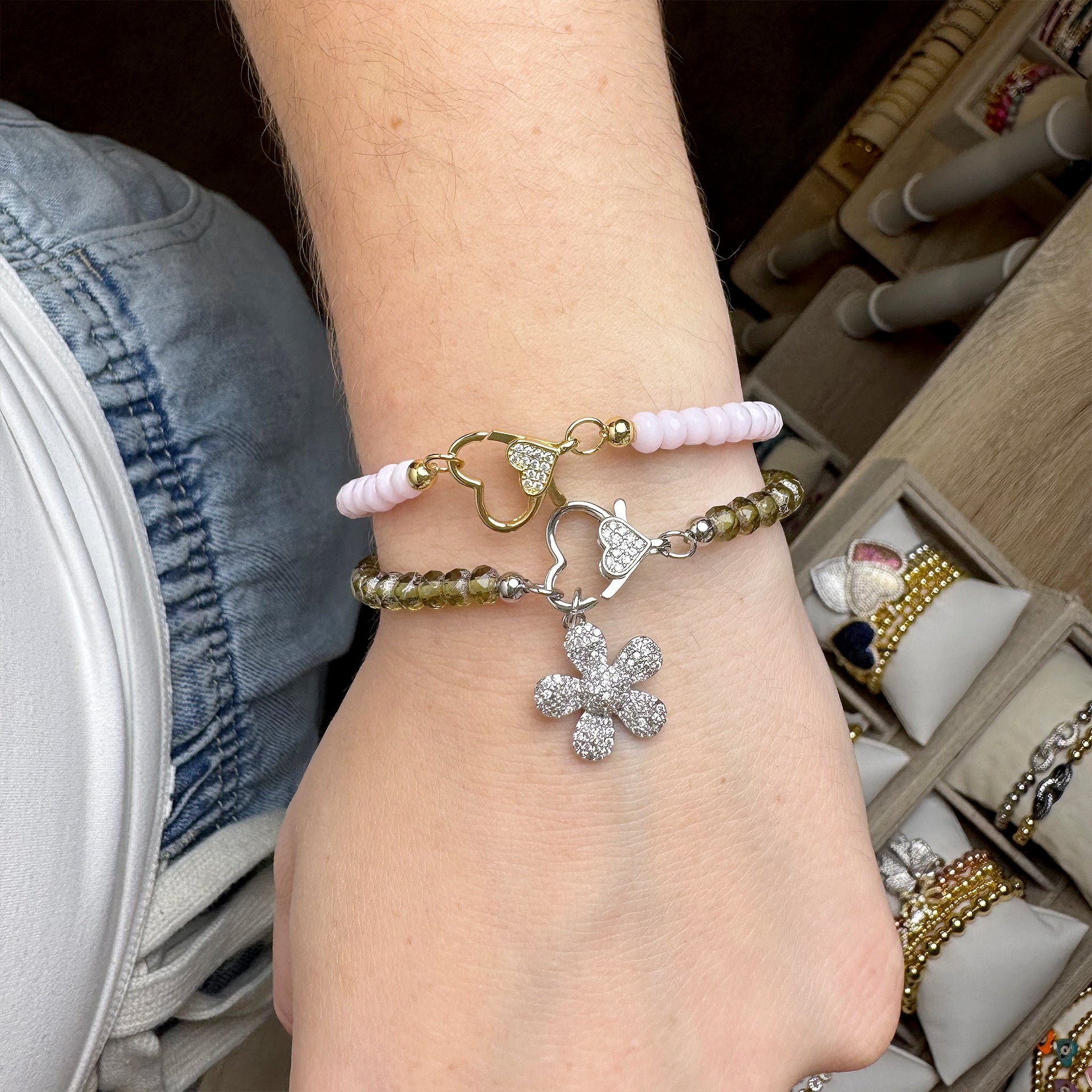 harper bracelet stacked on wrist with mini charm love lisa