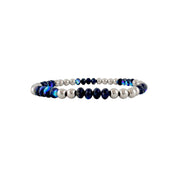 Beaded bracelet with blue and silver beads on a white background