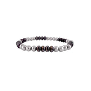 Beaded bracelet with alternating black and silver beads on a white background