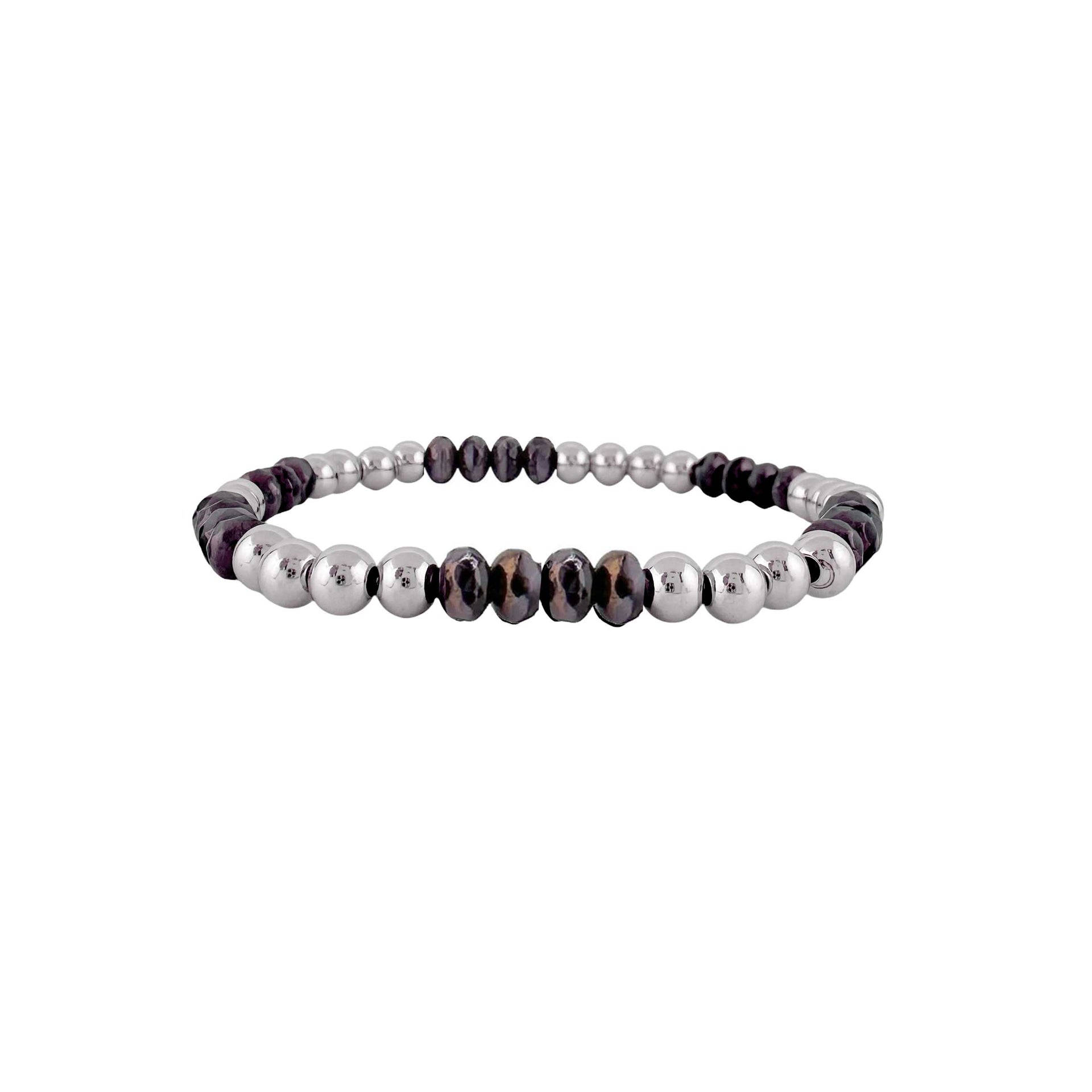 Beaded bracelet with alternating black and silver beads on a white background