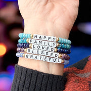 love lisa harper meaningful moments bracelet stack worn on wrist blue beaded word bracelets