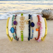 harper molly bow anklet display on beach with multiple color options Love Lisa