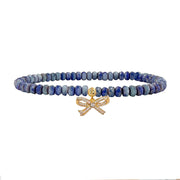 mykonos blue harper pretty cz bow bracelet with ocean blue faceted crystal beads and gold bow charm by Love Lisa