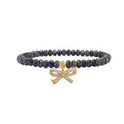 navy harper pretty cz bow bracelet with deep blue crystal beads and gold pave bow charm by Love Lisa