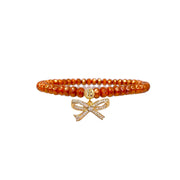 spicy orange harper pretty cz bow bracelet with faceted beads and gold crystal bow charm by Love Lisa