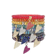 stack of colorful harper slanted heart beaded bracelets showing assorted crystal bead colors and pavé heart charms by Love Lisa