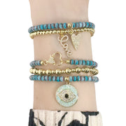 harper slanted heart beaded bracelets stacked on wrist featuring multicolor faceted beads and heart charms by Love Lisa