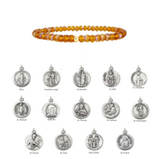 Set of silver religious medals with corresponding names on a white background