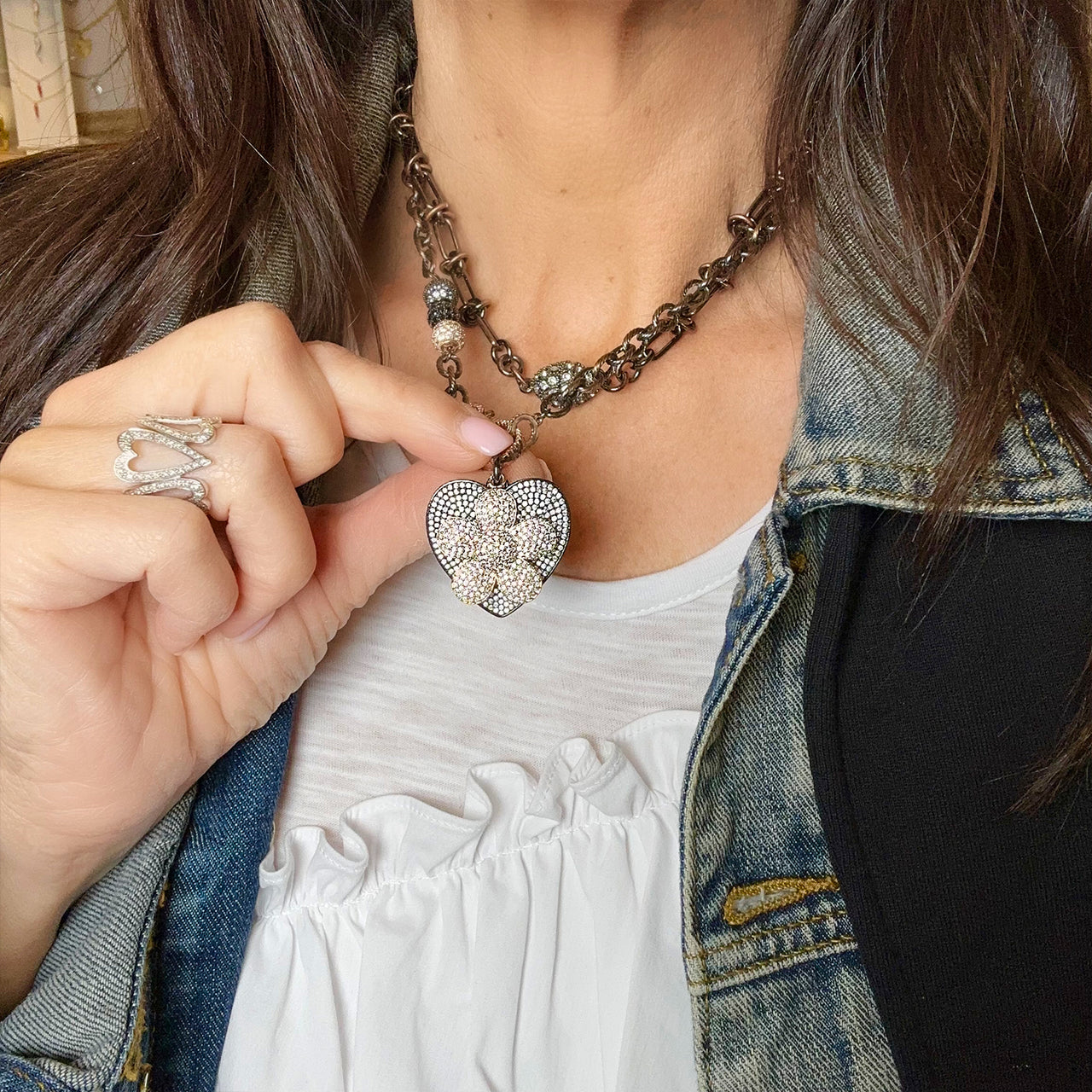 love lisa heart flower charm necklace styled on model