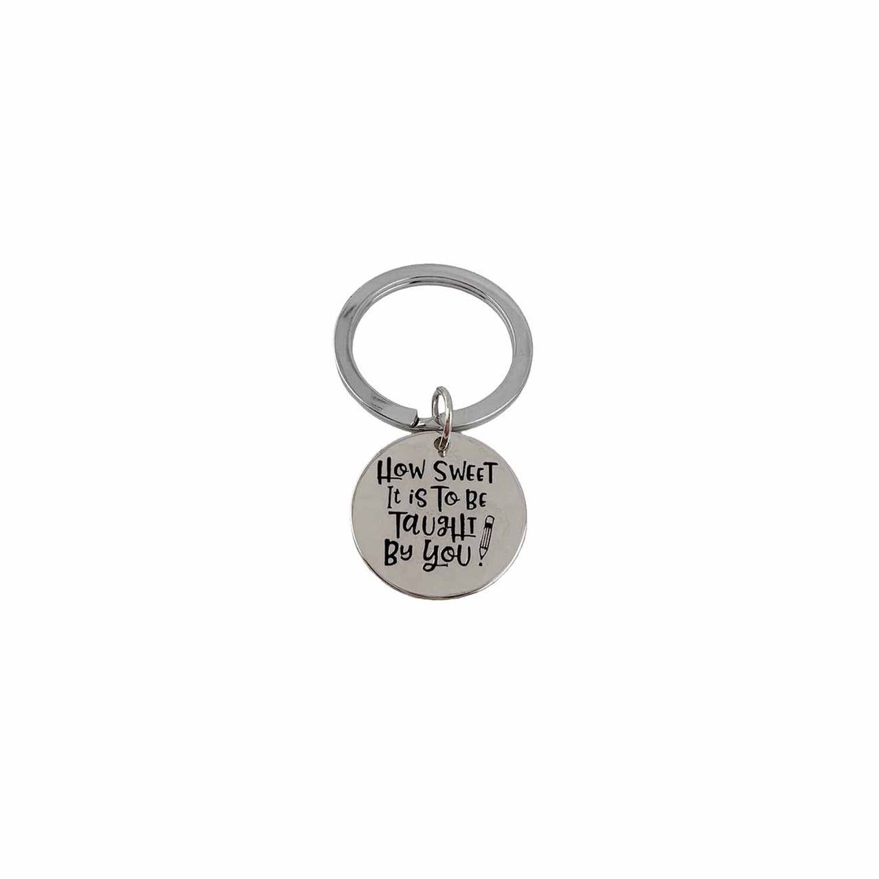 close up of engraved teacher keychain reading how sweet it is to be taught by you by Love Lisa