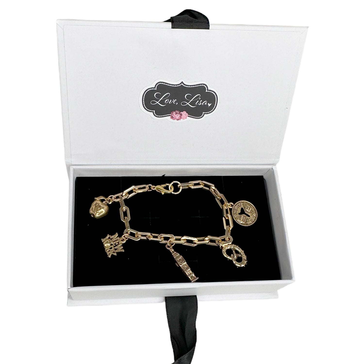 i love new york charm bracelet displayed in black gift box with gold charms by Love Lisa