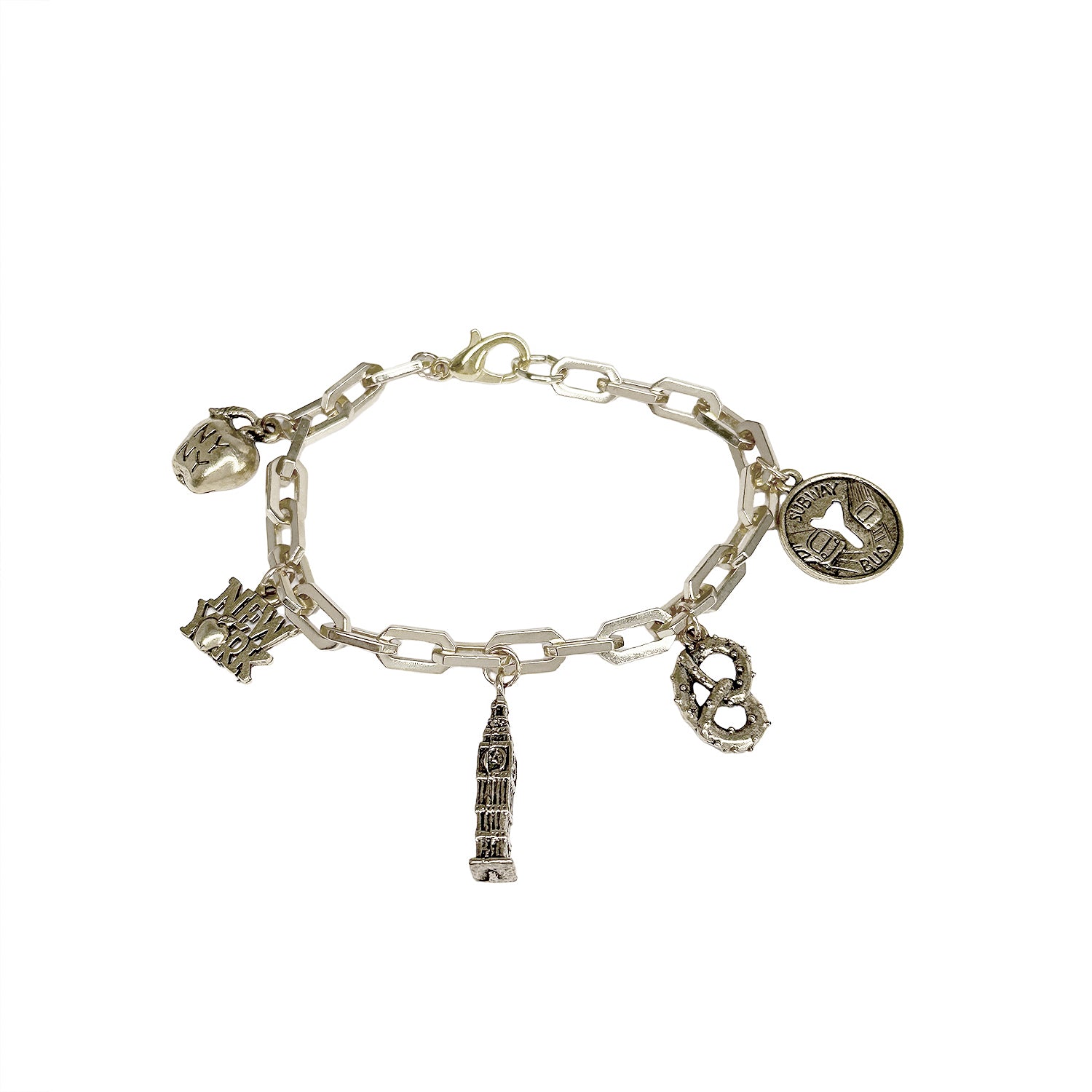 close up of silver I love new york bracelet charms including nyc apple pretzel and empire state building by Love Lisa