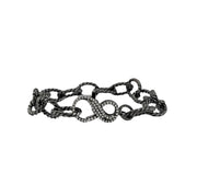 gunmetal infinity clasp chain bracelet featuring dark textured rope chain and pavé crystal infinity clasp design