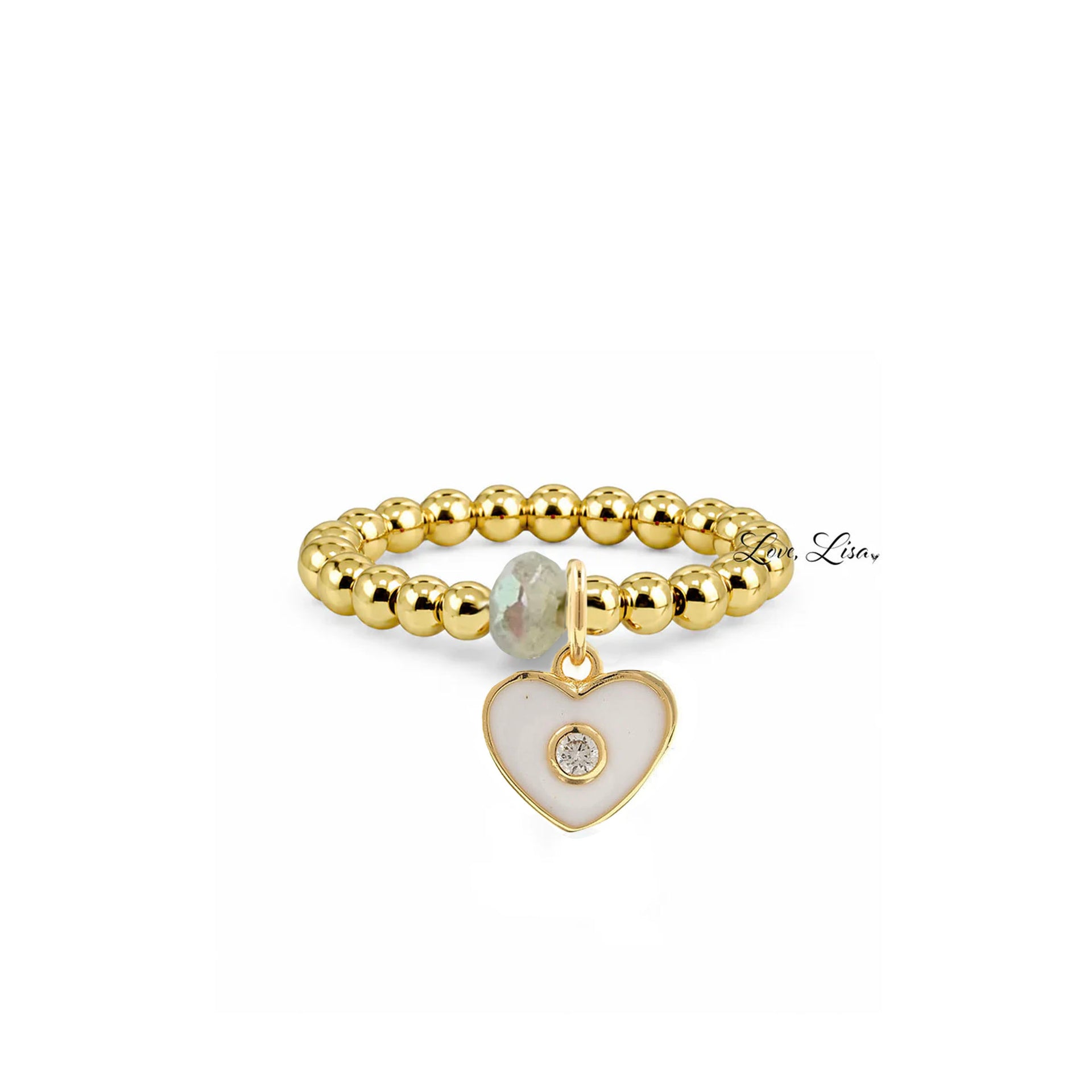 Isabella Enamel Crystal Heart Stretch Ring in gold with white enamel heart charm crystal center and faceted accent bead