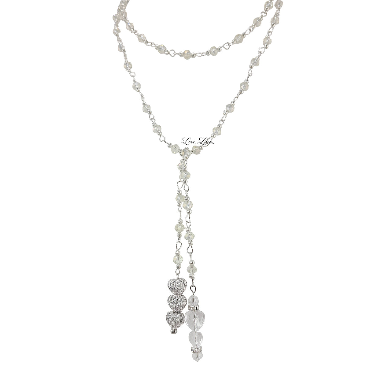 Love Lisa triple heart crystal lariat necklace in silver with cascading pavé heart drop and clear AB crystal accents