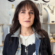 Love Lisa triple heart crystal lariat necklace worn as long statement wrap style with shimmering crystal heart drop