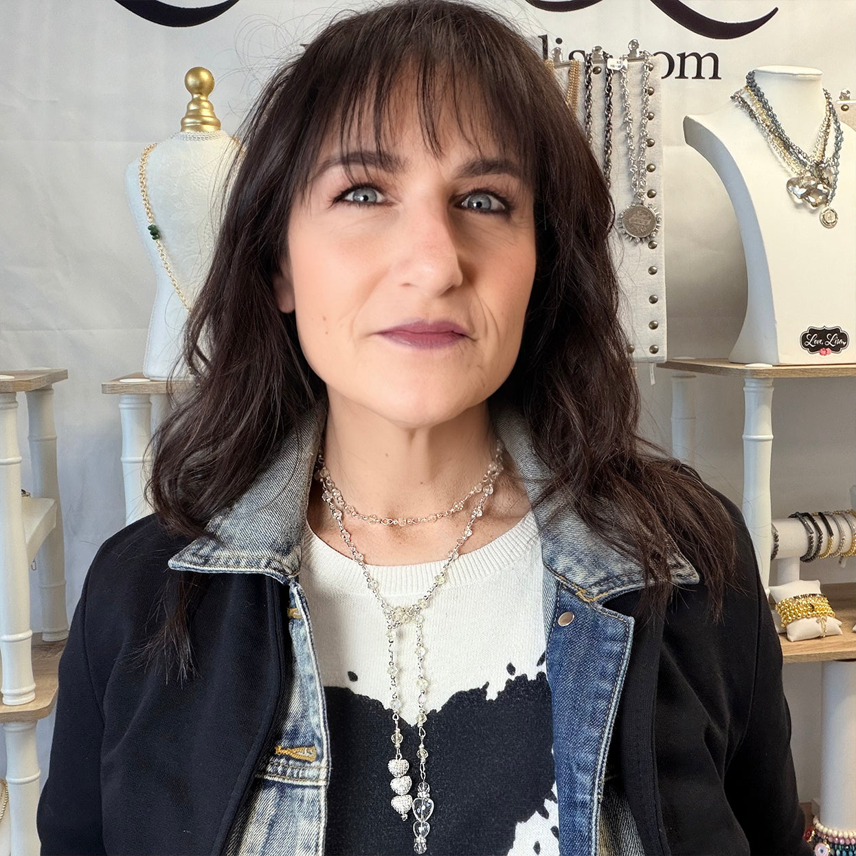 Love Lisa triple heart crystal lariat necklace worn as long statement wrap style with shimmering crystal heart drop