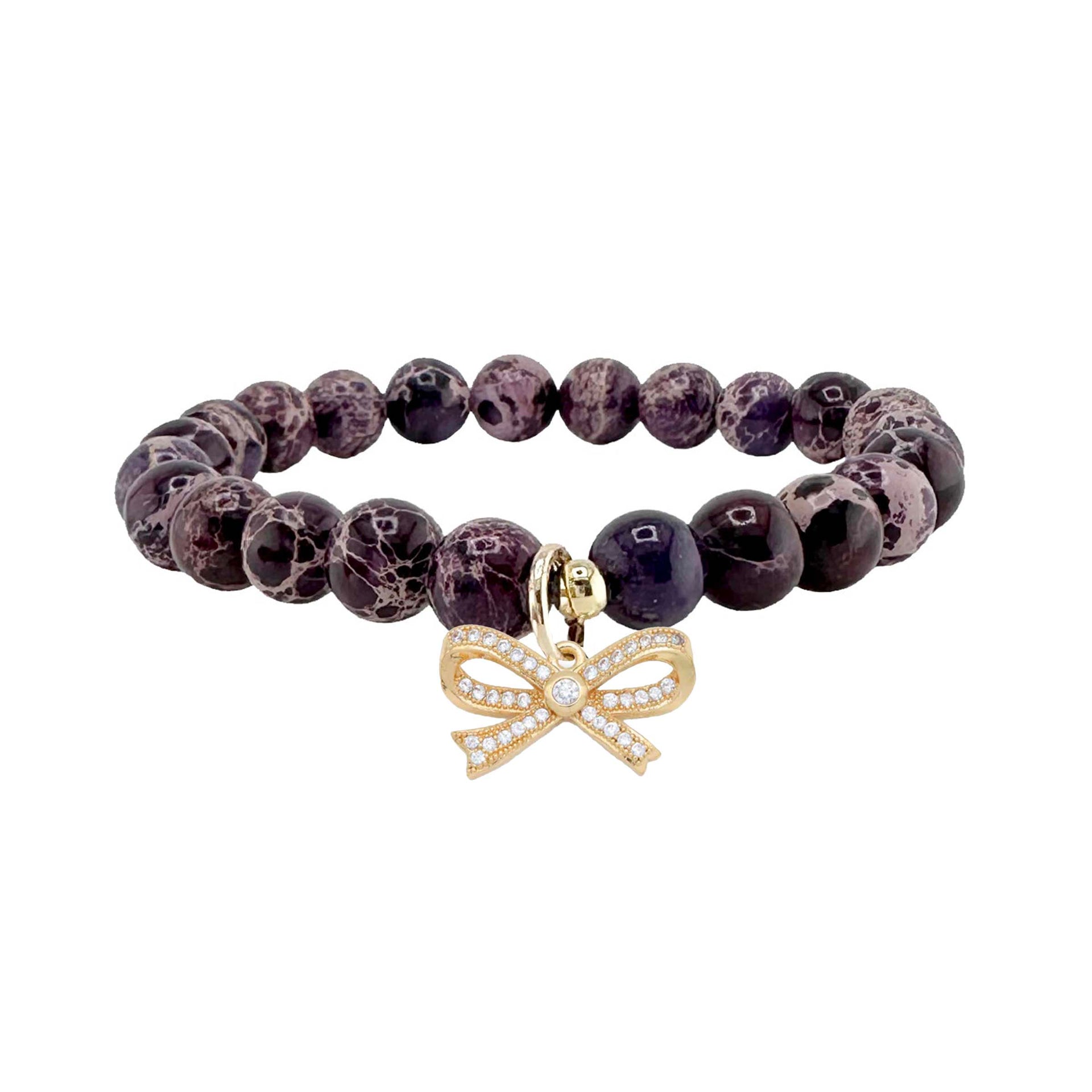 purple sea sediment jasper bow bracelet with dark marbled purple stones and gold bow charm