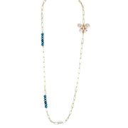 Ivory monarch butterfly charm necklace with turquoise crystal beads on gold chain