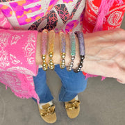 Love Lisa Ivy Luxe Pavé Bar Bracelet on model wrist layered with other bracelets

