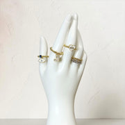 Love Lisa Jaime Trifecta Stretch Ring Set displayed on hand form with three mixed metal stretch rings