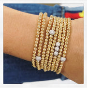 love lisa jen stack of beaded bracelets gold on wrist 4mm beaded stretch bracelets layered stack