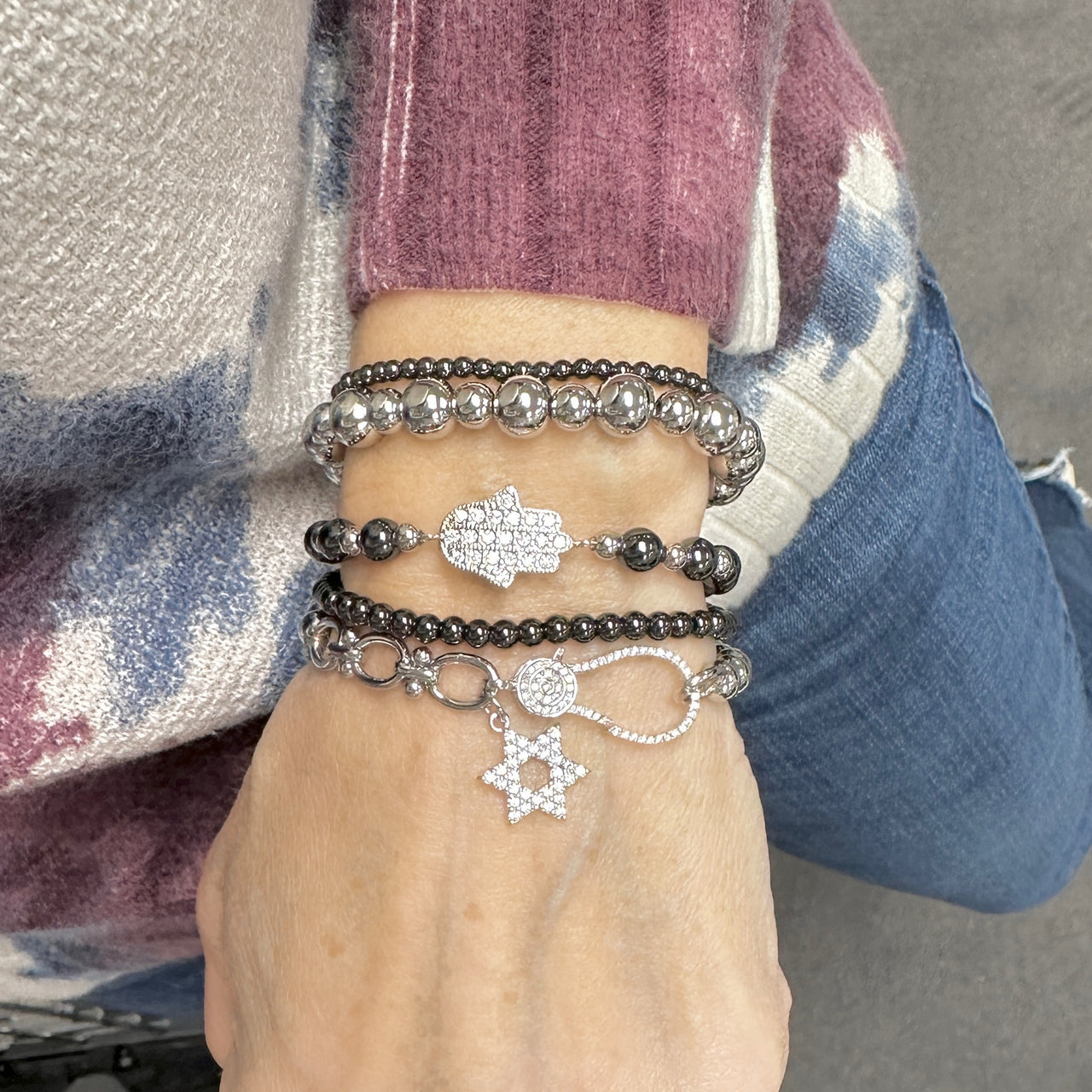 love lisa larissa crystal star of david stretch bracelet on wrist stacked beaded bracelets with star of david charm