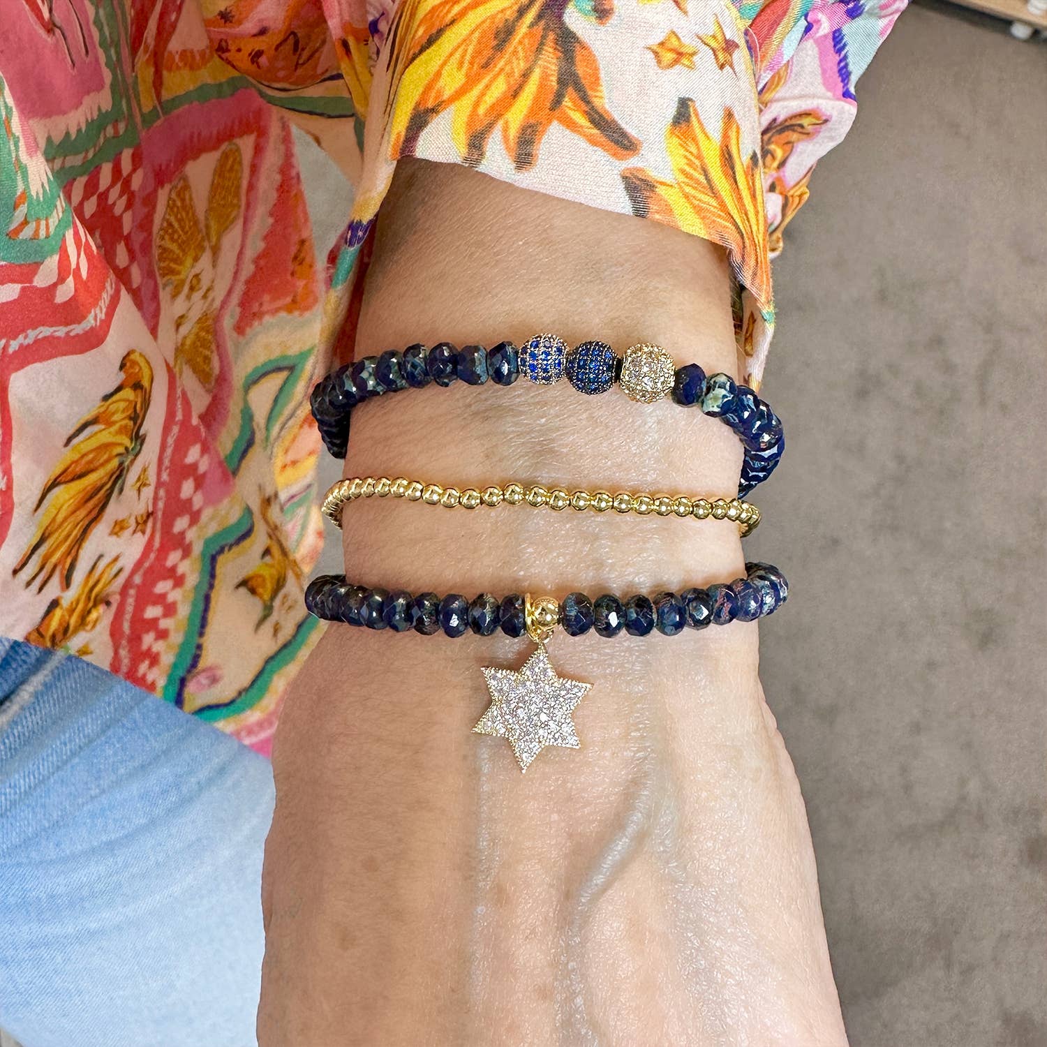 love lisa leah navy star of david bracelet stack styled with casual outfit navy and gold beaded bracelets with star of david charm
