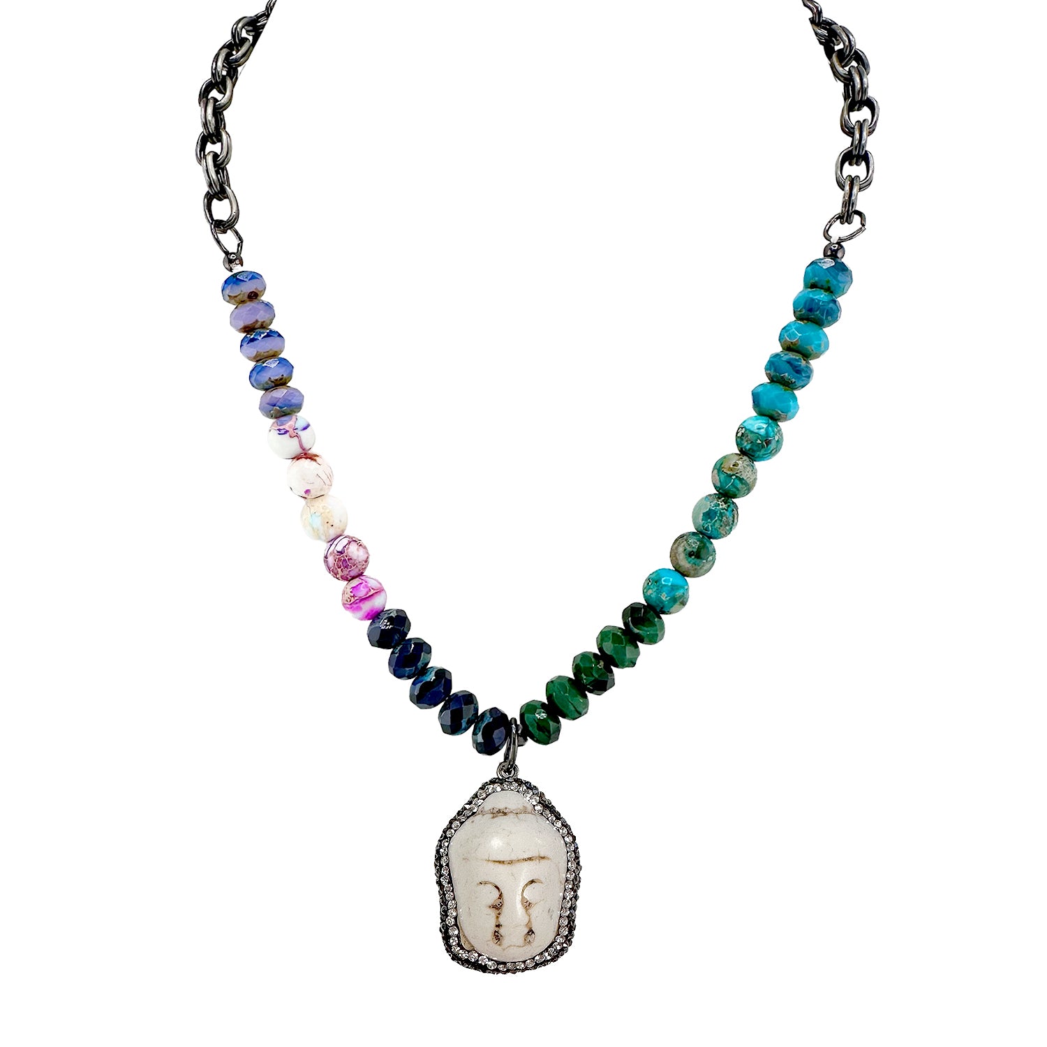 A beaded necklace with a Buddha head pendant, featuring a gunmetal chain and multicolored beads.
