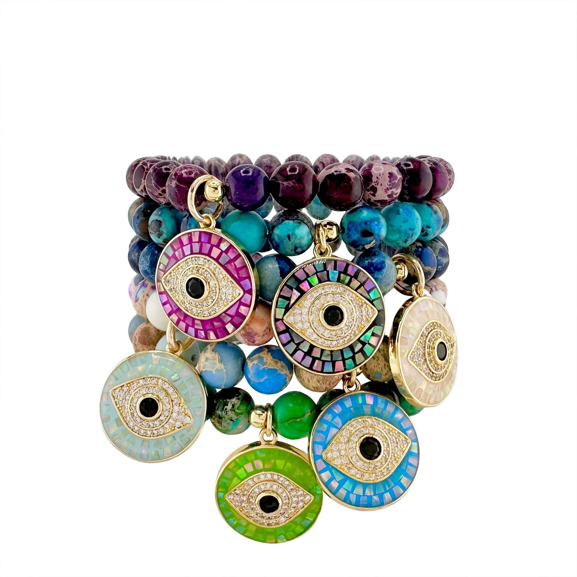 Colorful beaded bracelets with eye-shaped charms on a white background