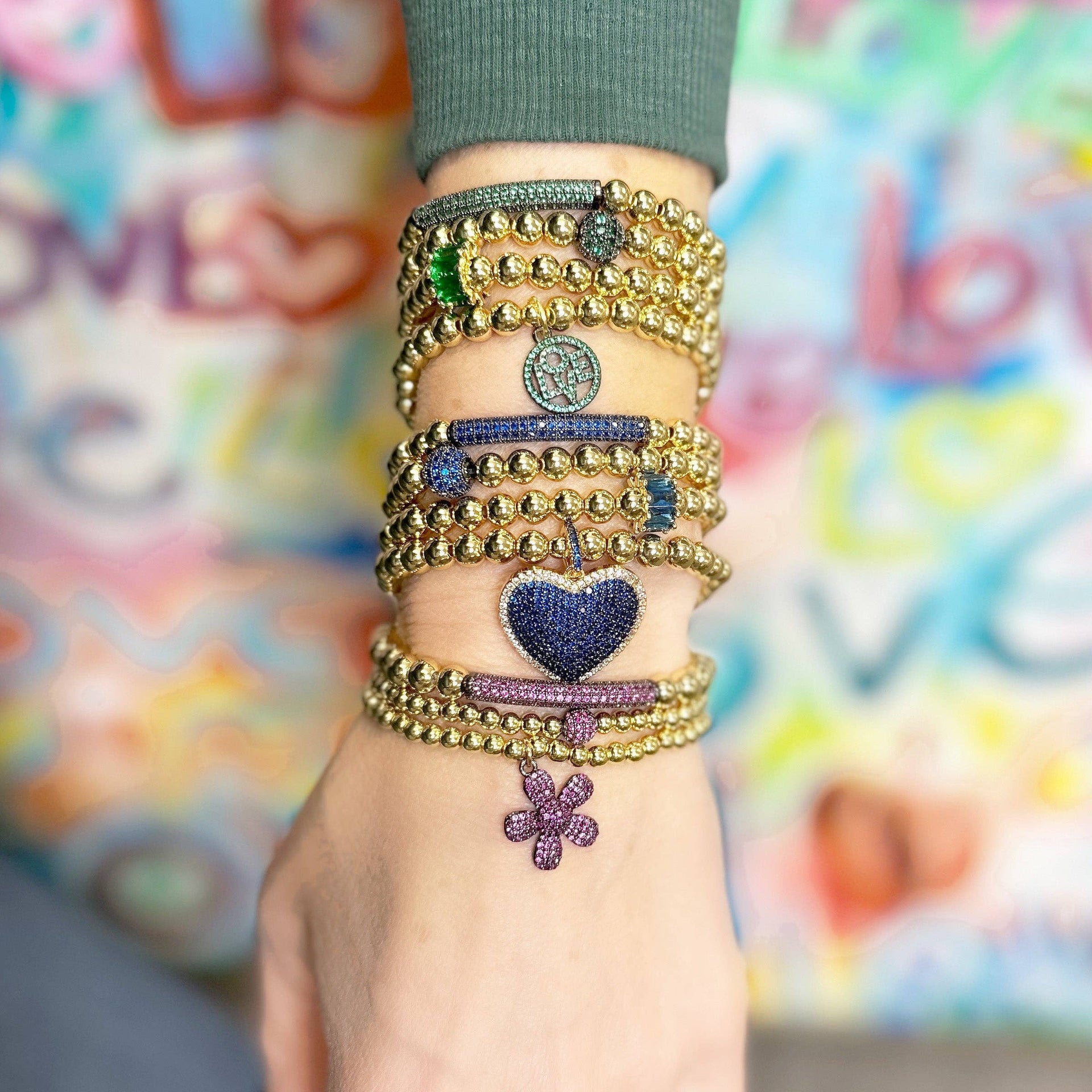 love lisa lexi colorful bar bracelet stacked on wrist gold beaded pave bracelet