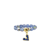 Lexi Slanted Heart Crystal Stretch Ring in blue with faceted crystal beads and pavé heart charm