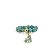 Love Lisa Lexi Slanted Heart Crystal Stretch Ring in turquoise with faceted crystal beads and pavé heart charm