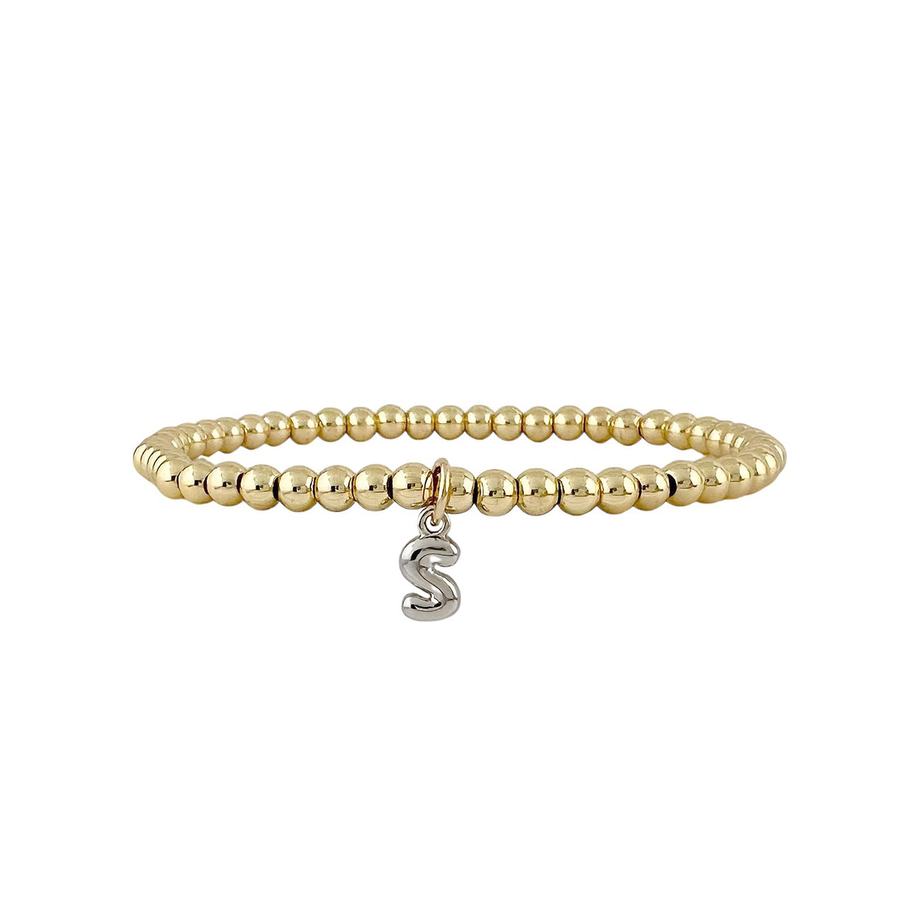 gold beaded lila bubble letter initial bracelet with small silver s charm hanging at center