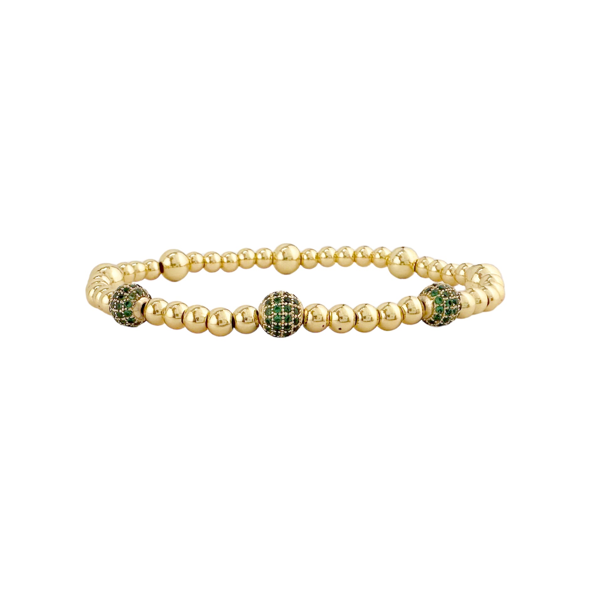 gold lilly pave bracelet styled with green pave accent charm paired with smooth beads