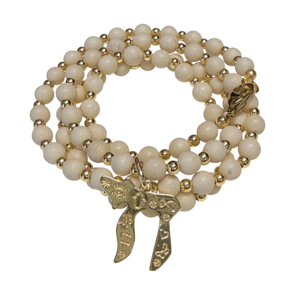 Liora Gemstone Beaded Chai Necklace coiled with creamy ivory fossil jasper beads, coordinating metal accents, and engraved Chai to Life pendant