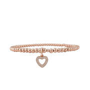 Rose gold bracelet with a heart-shaped charm on a white background