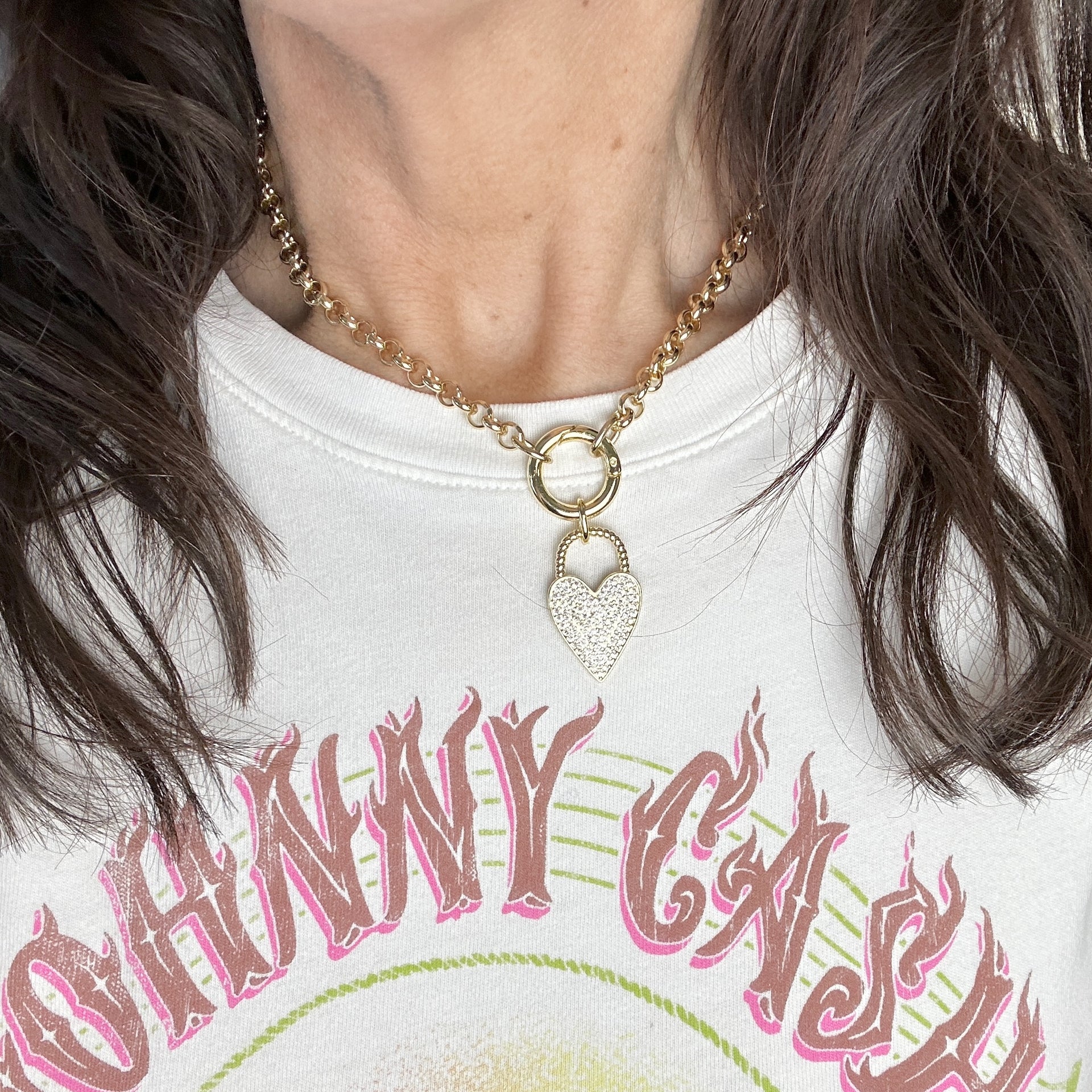 Gold pavé heart lock charm with twisted handle on large clasp

