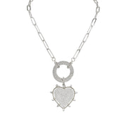 silver stellar heart charm necklace with spiked pavé design

