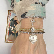 Love Lisa Subliminal Saint Anthony beaded bracelet worn on wrist womens size