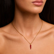 Love Lisa red Italian horn necklace worn on neck with delicate gold chain and protection jewelry styling