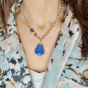 lumbini blessings buddha necklace medium blue pendant love lisa on model