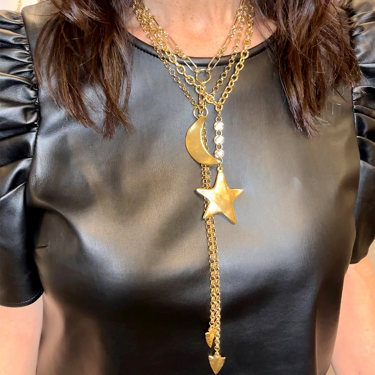 woman wearing gold moon medallion necklace layered celestial jewelry by Love Lisa